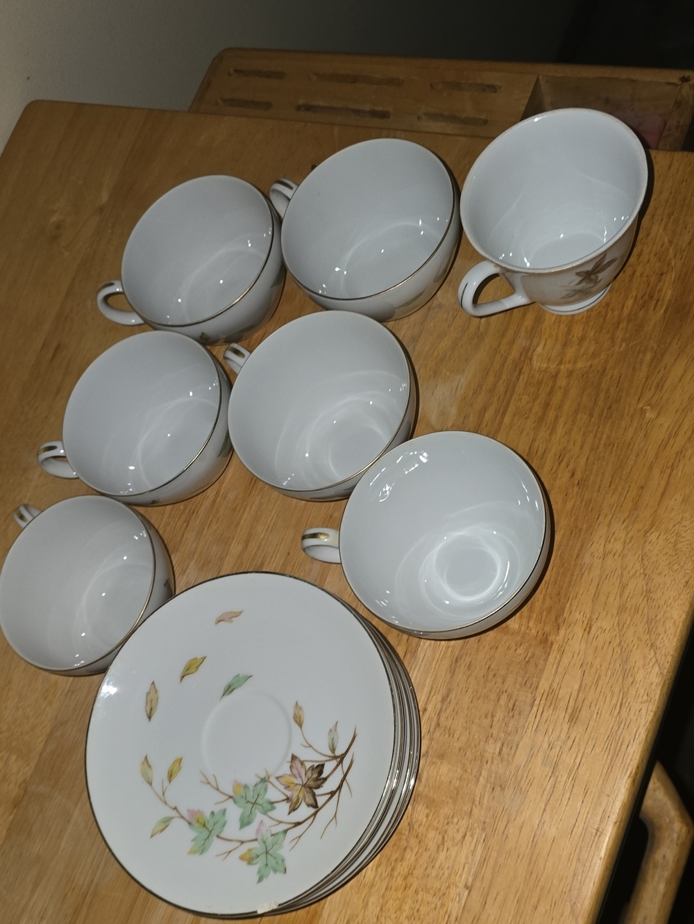 Swirling Leaves China Tea Cup and Saucer Set in White with Gold Trim